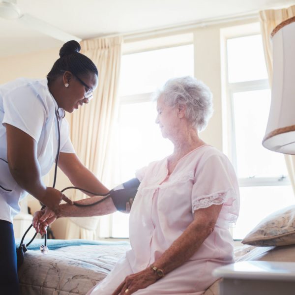 Nurse-checking-blood-pressure